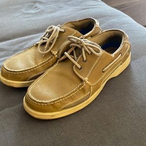 Tan Dockers boat shoes. Condition: Used to like new. Worn infrequently. 11M
